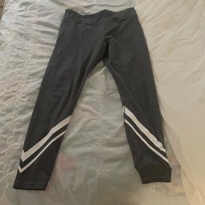 Tory sport compression leggings with side pockets and ankle length